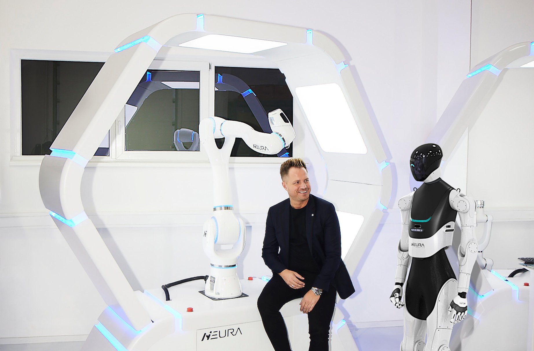 David Reger with cognitive robot MAiRA and humanoid robot 4NE-1