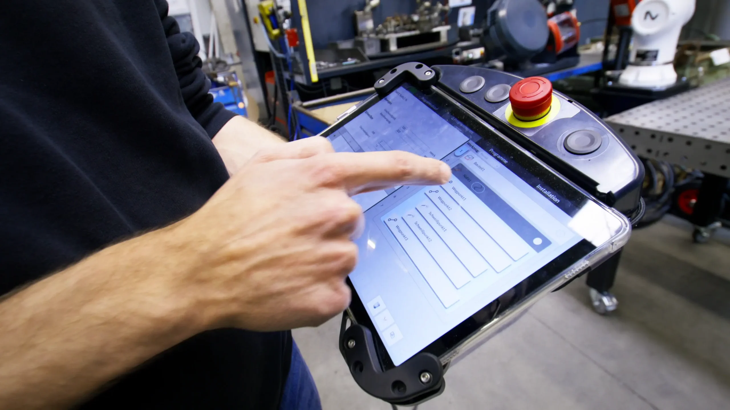 technician programming lara cobot