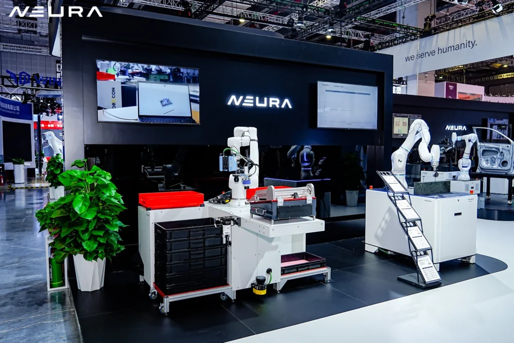 Two MAiRA cognitive robots connected through the Neuraverse at CIIF 2026